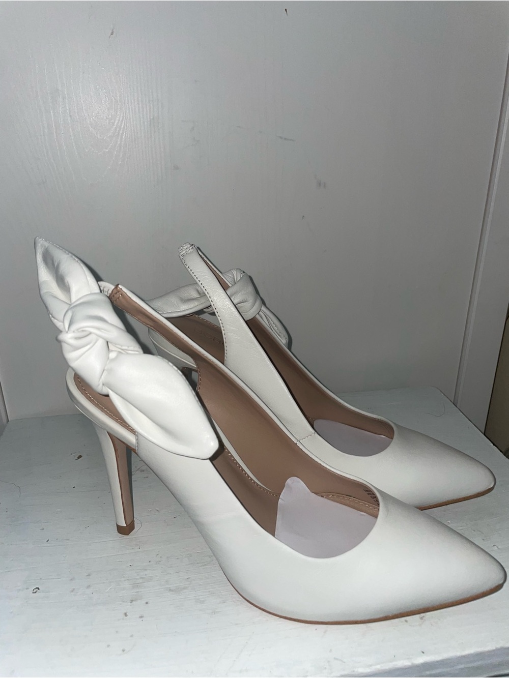 BCBGeneration White Pointed Toe Slingback Heels with Knot Accent